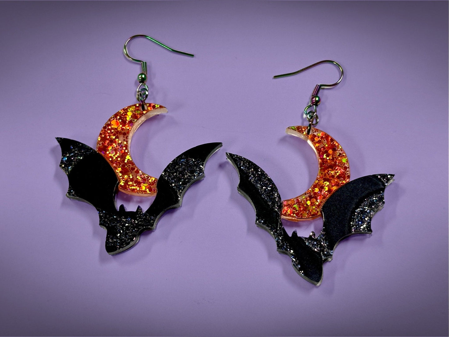 Bat and Crescent Moon Earrings | Asymmetrical Black Crackle and Holographic Orange Glitter Halloween Dangles - Painted Raina