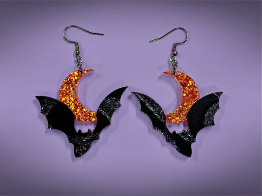 Bat and Crescent Moon Earrings | Asymmetrical Black Crackle and Holographic Orange Glitter Halloween Dangles - Painted Raina