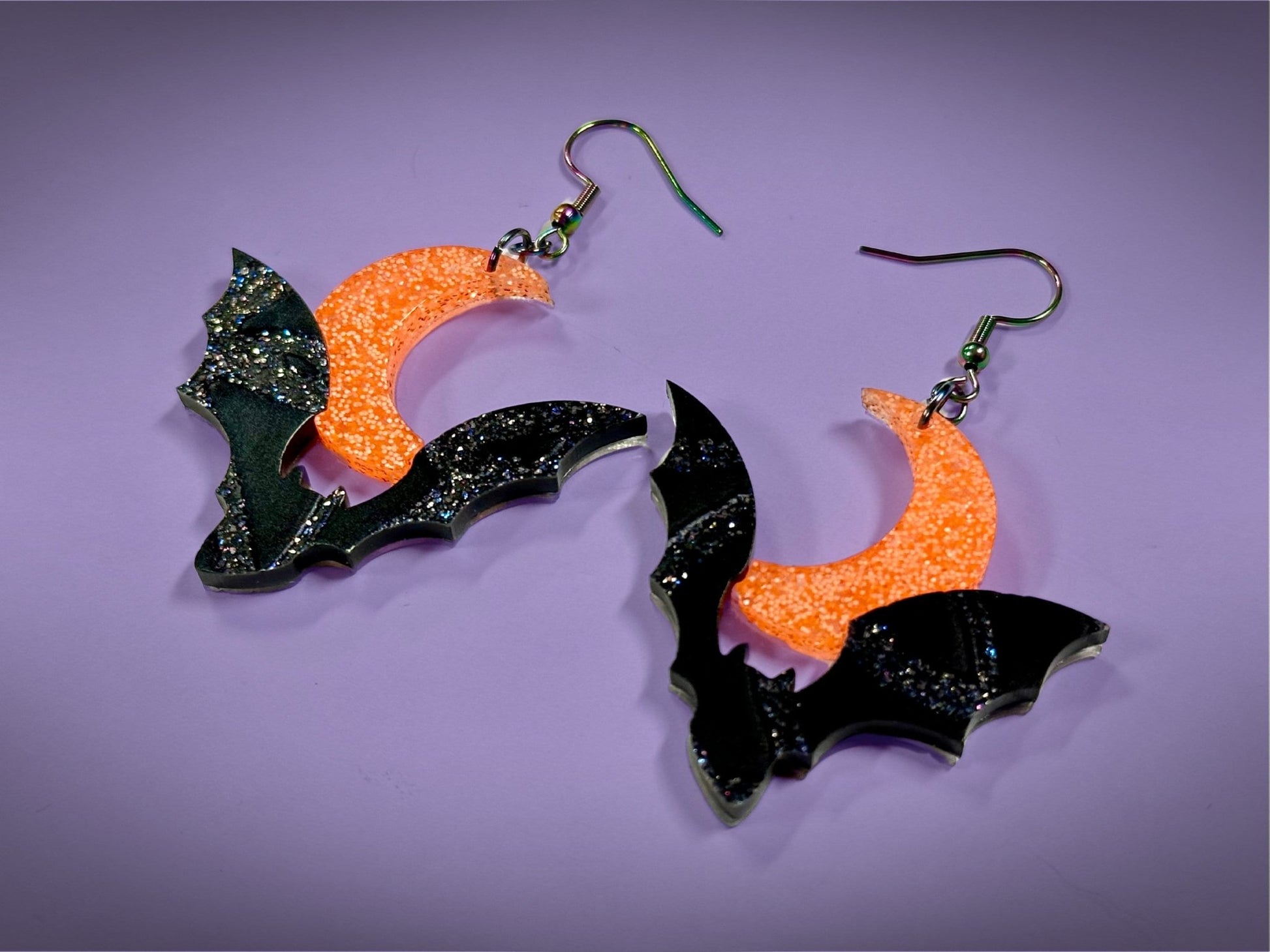 Bat and Crescent Moon Earrings | Asymmetrical Black Crackle and Holo Orange Glitter Halloween Dangles - Painted Raina