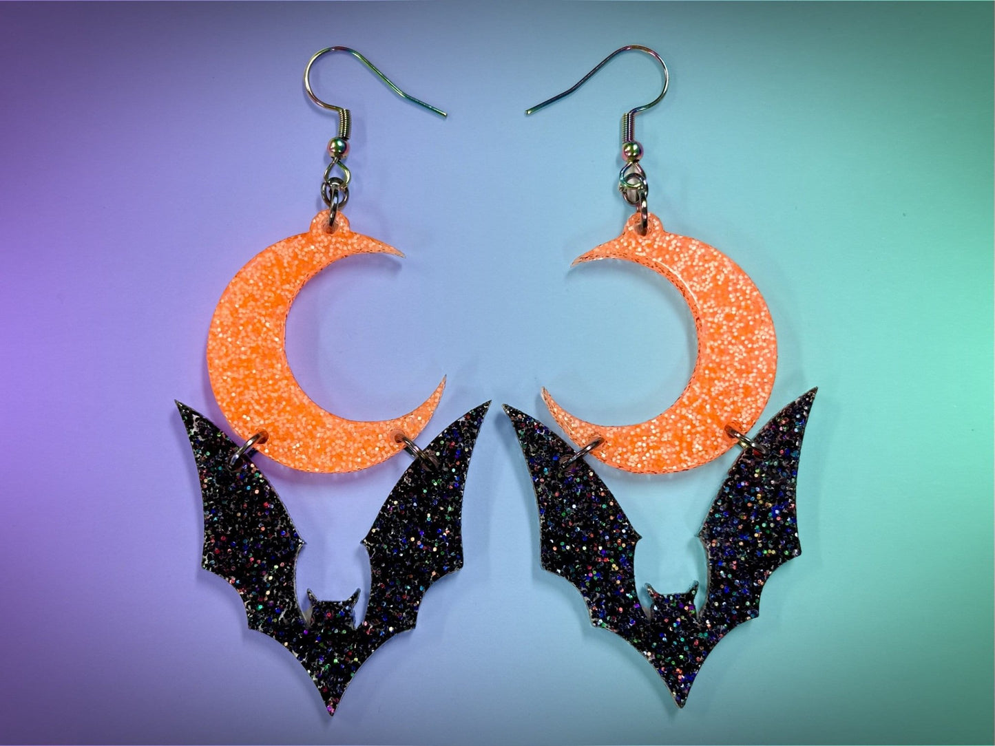 Bat and Crescent Moon Earrings | Black Rainbow Glitter and Neon Orange Glitz Halloween Dangles ! - Painted Raina