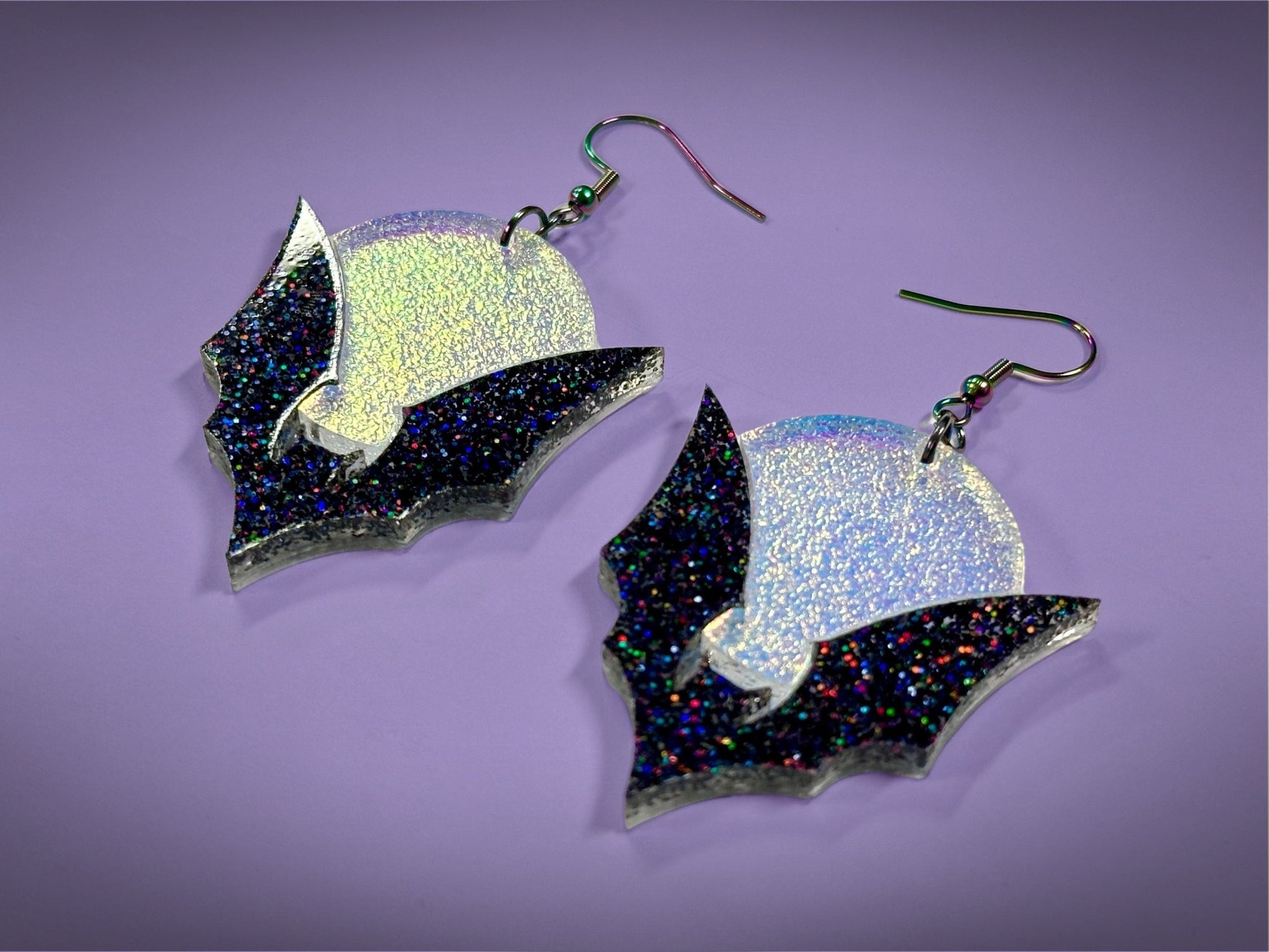 Bat and Full Moon Earrings | Black Rainbow Glitter and Textured Iridescent Halloween Dangles - Painted Raina