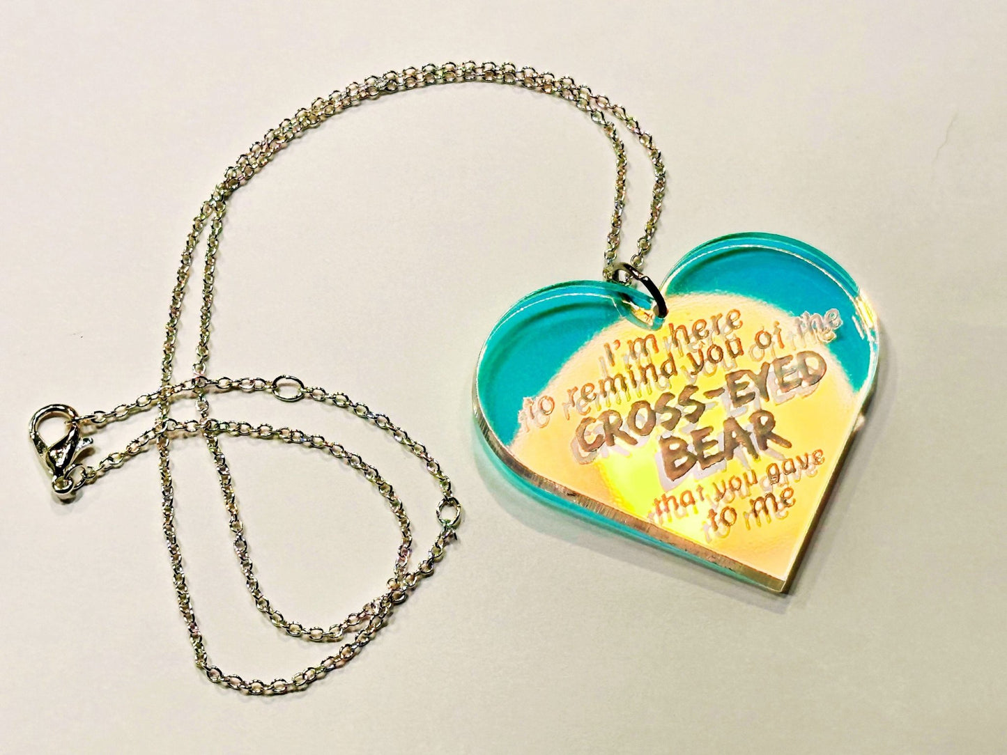 Misheard Lyrics Pendant | Cross-Eyed Bear - Painted Raina