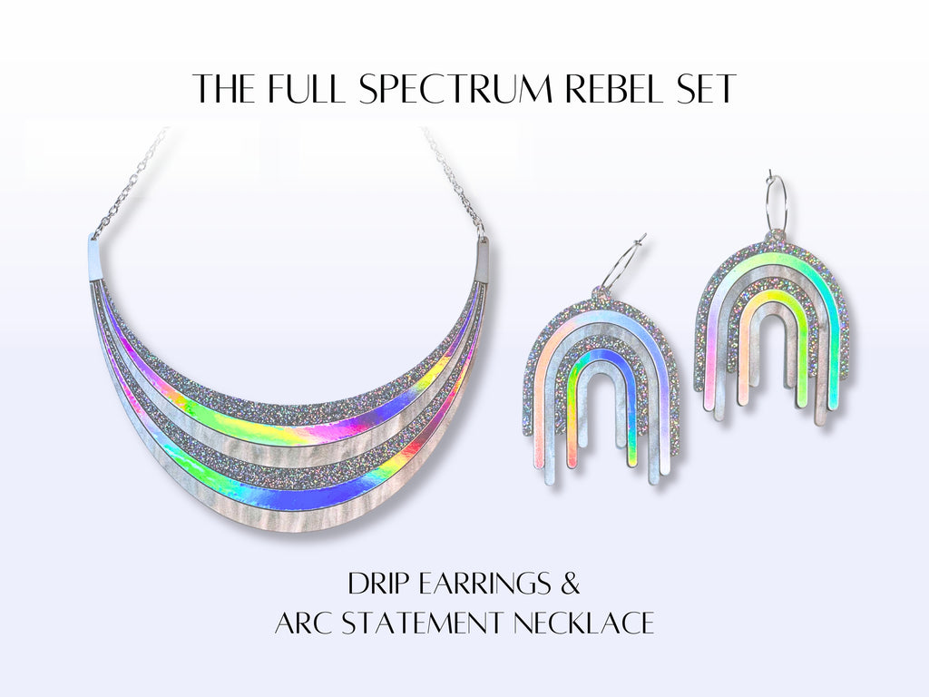Full Spectrum Rebel Disco Prism jewelry set showing the arc statement necklace and matching drip earrings.