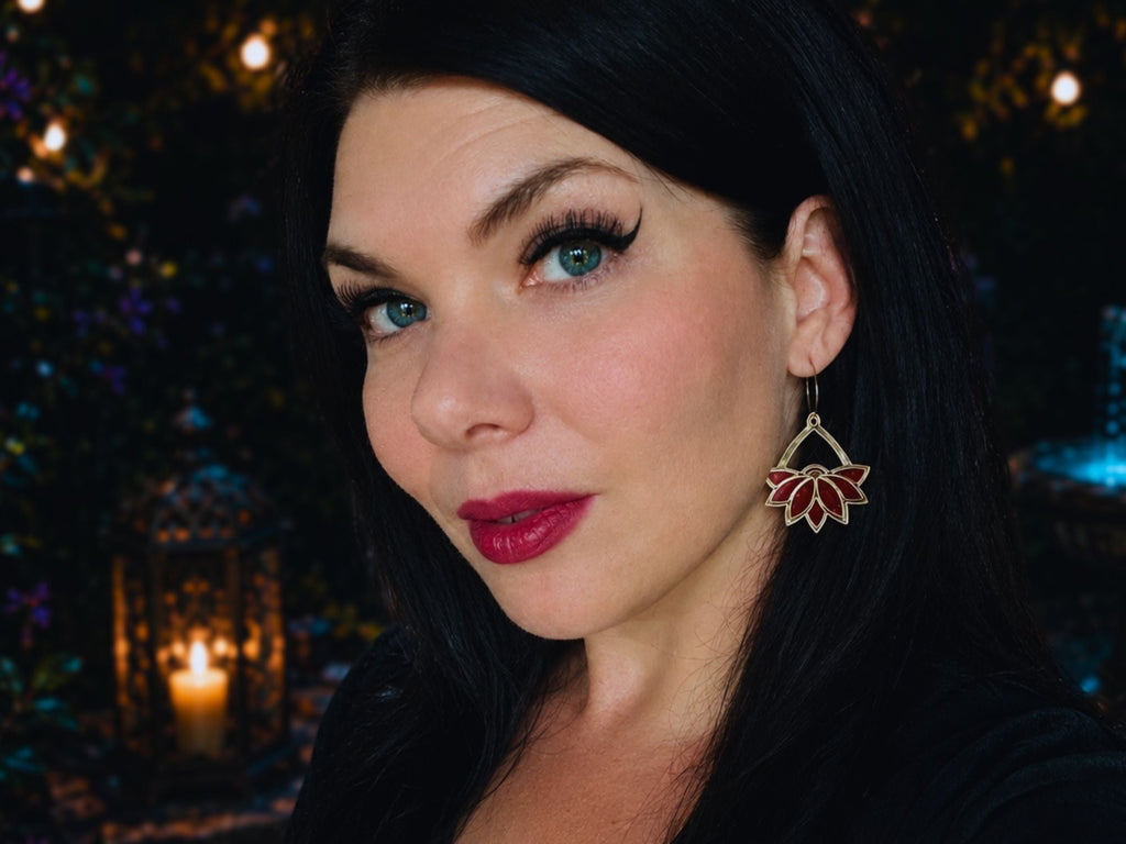 Woman wearing Art Deco lotus hoop earrings demonstrating scale and fit