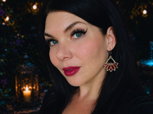 Woman wearing Art Deco lotus hoop earrings demonstrating scale and fit