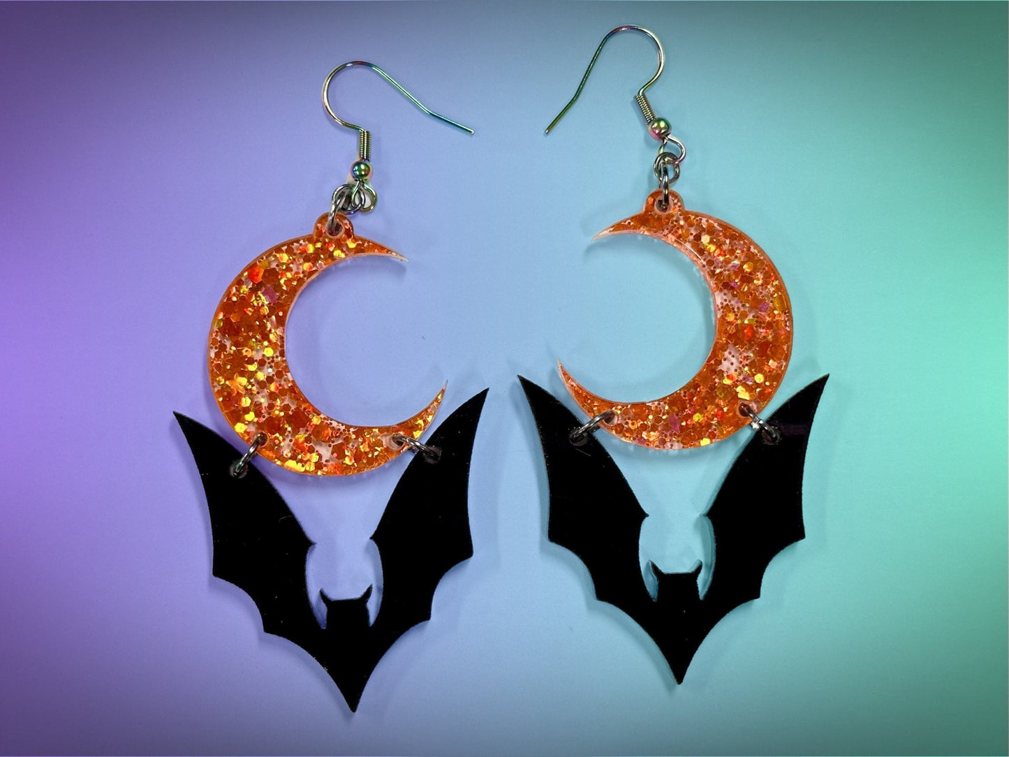 Bat and Crescent Moon Earrings | Black and Holographic Harvest Orange Glitter Halloween Dangles ! - Painted Raina