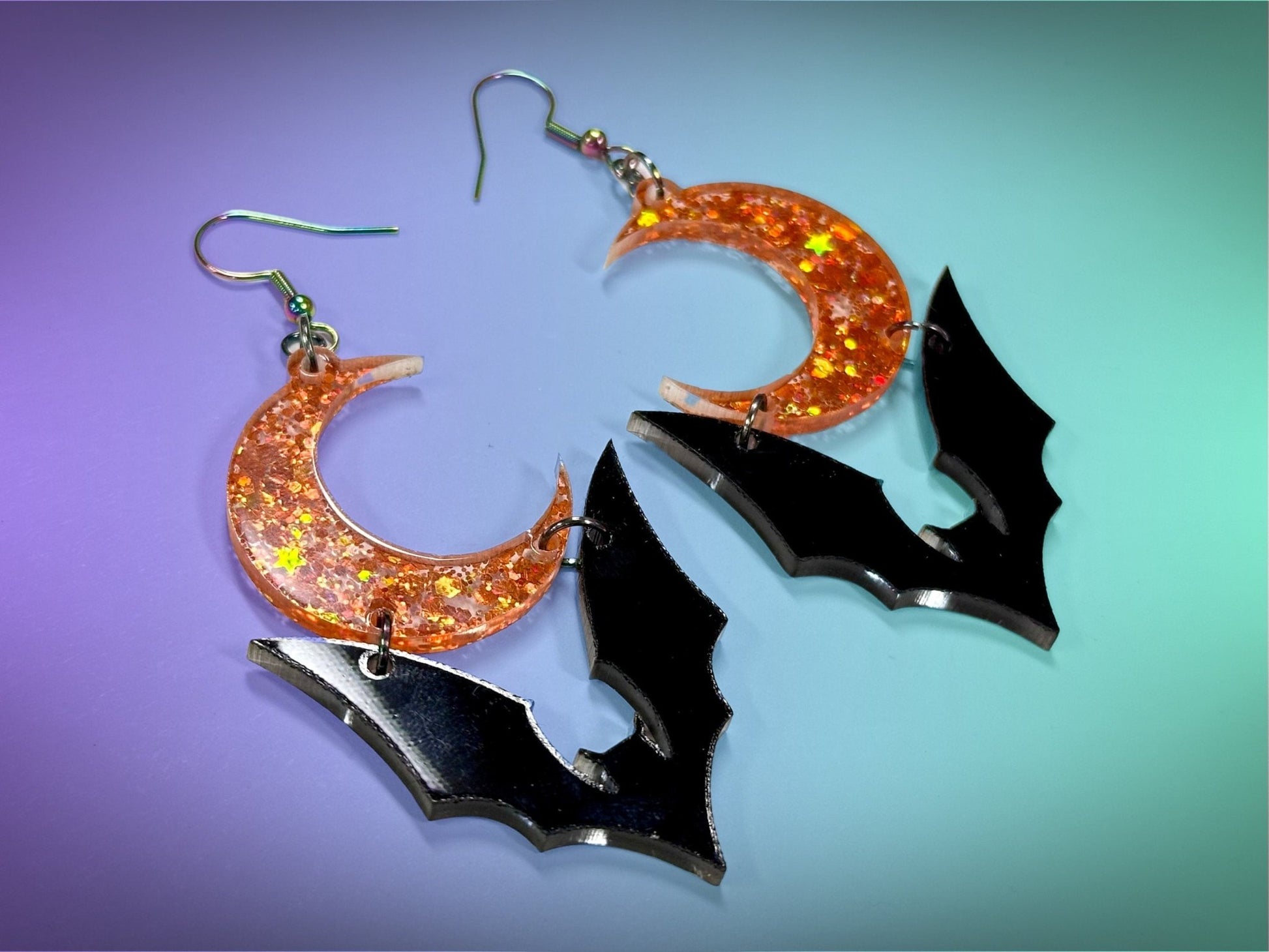 Bat and Crescent Moon Earrings | Black and Holographic Harvest Orange Glitter Halloween Dangles ! - Painted Raina