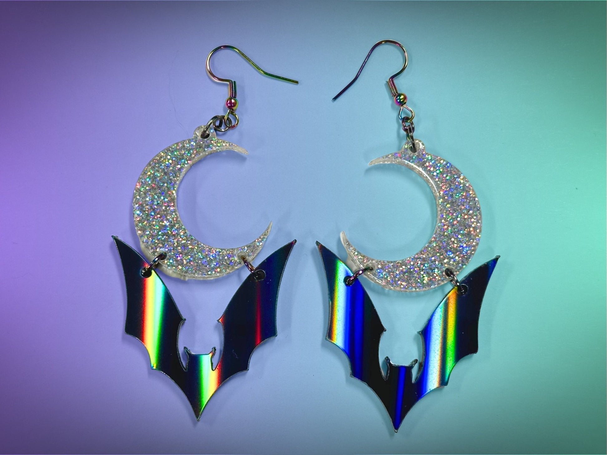 Bat and Crescent Moon Earrings | Black Rainbow and Silver Holographic Glitter Halloween Dangles ! - Painted Raina