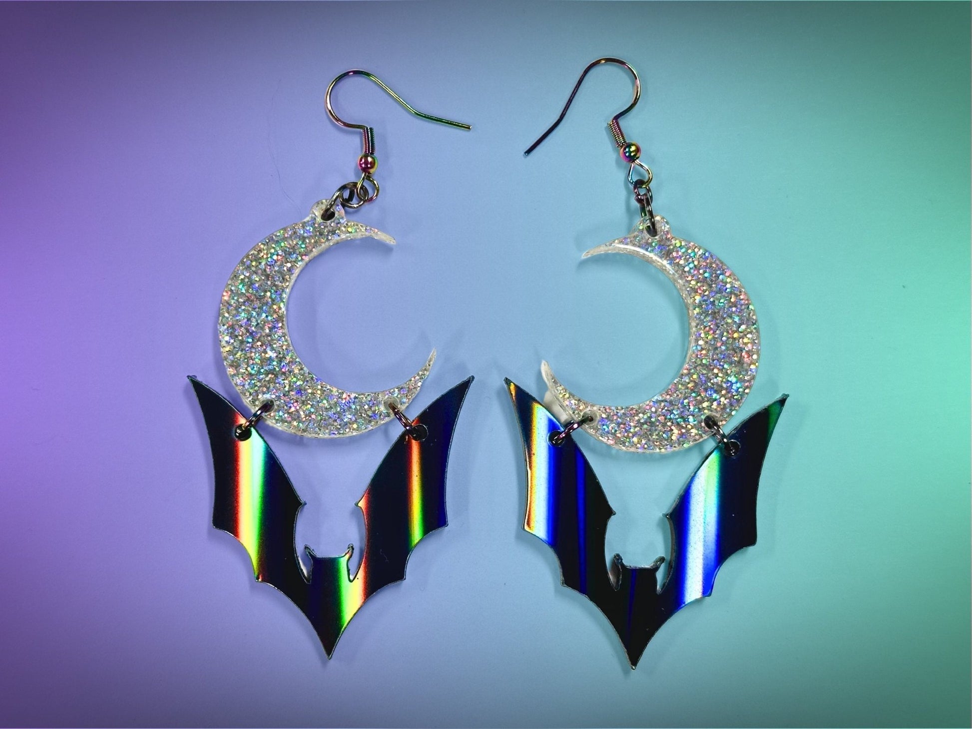 Bat and Crescent Moon Earrings | Black Rainbow and Silver Holographic Glitter Halloween Dangles ! - Painted Raina