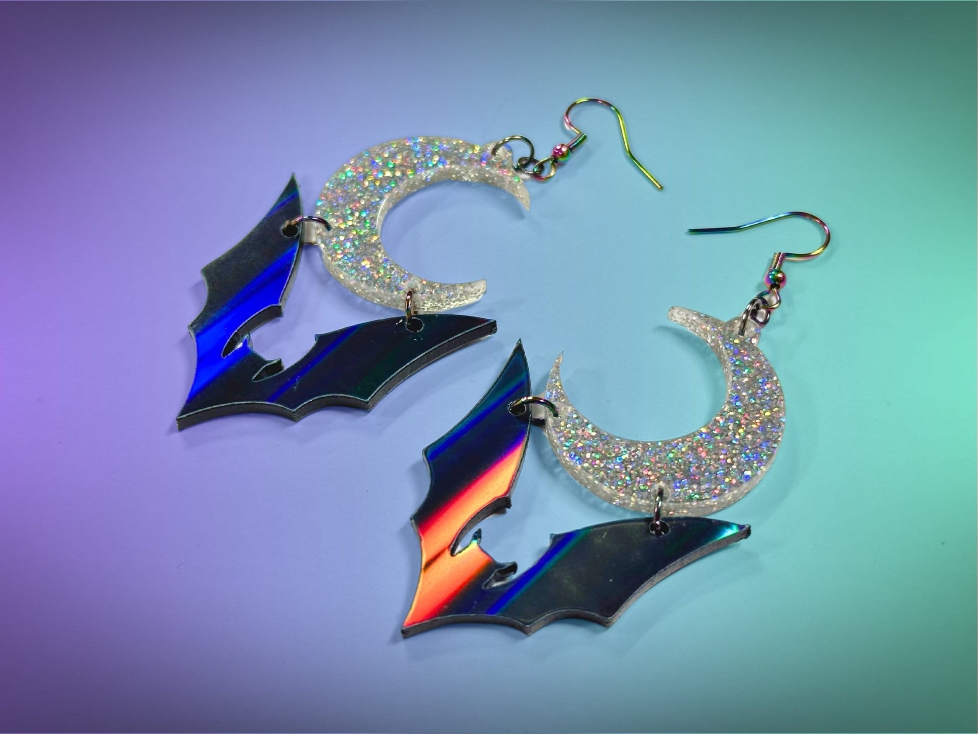 Bat and Crescent Moon Earrings | Black Rainbow and Silver Holographic Glitter Halloween Dangles ! - Painted Raina