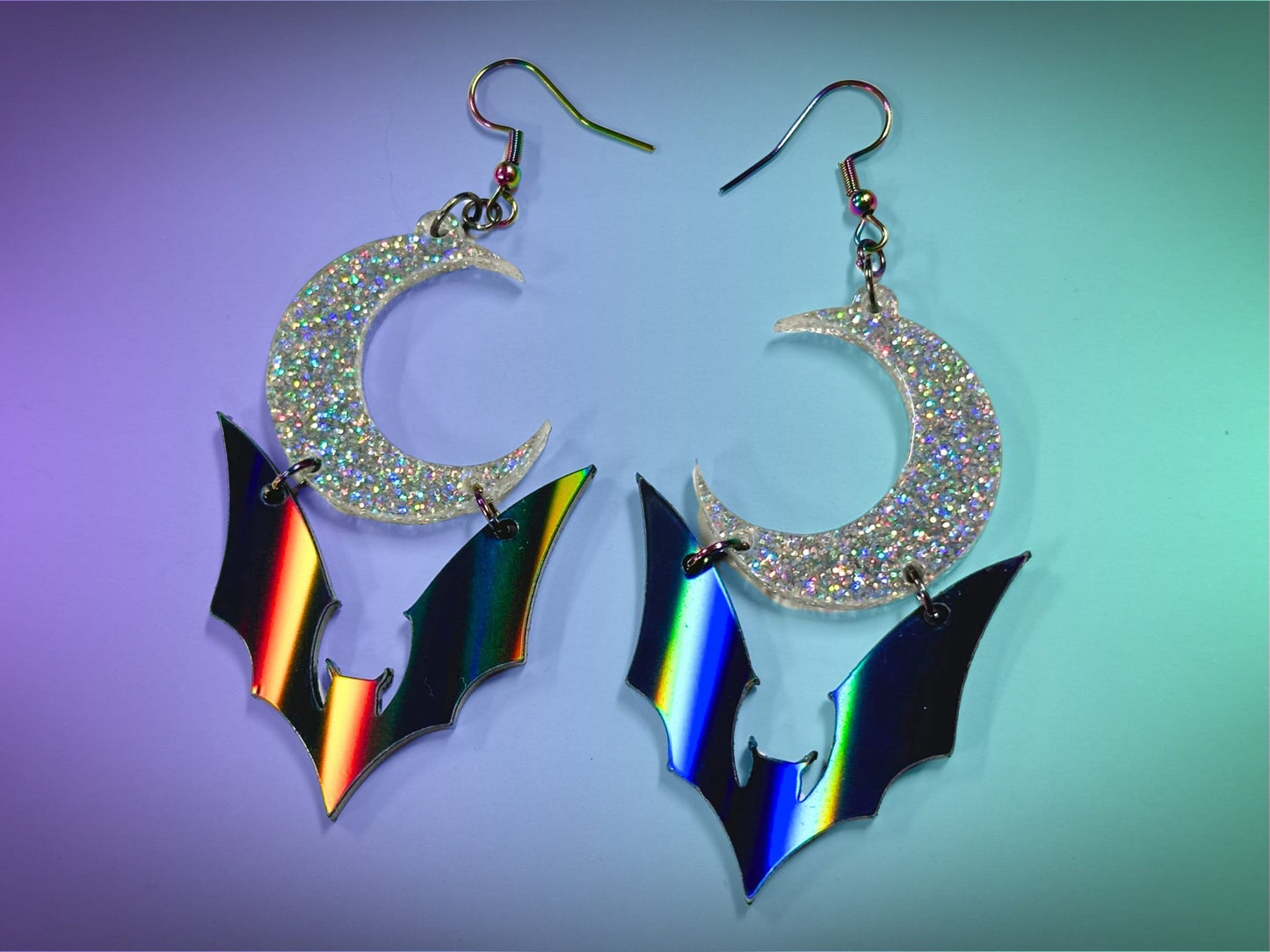 Bat and Crescent Moon Earrings | Black Rainbow and Silver Holographic Glitter Halloween Dangles ! - Painted Raina