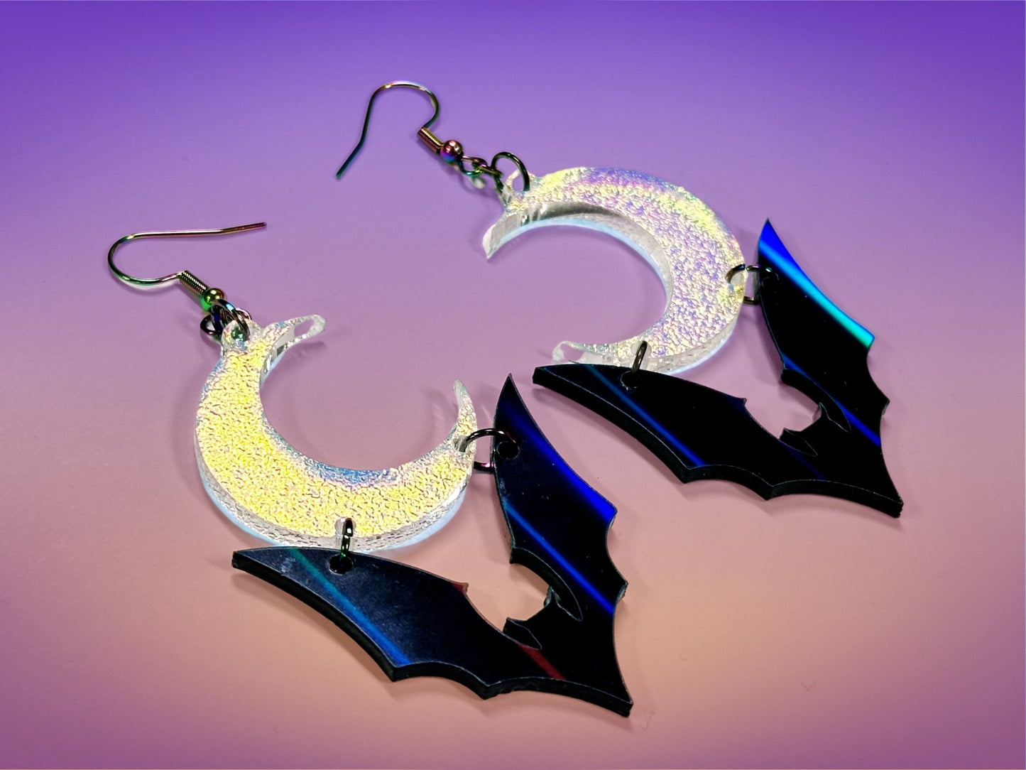 Bat and Crescent Moon Earrings | Black Rainbow Holographic and Iridescent Halloween Dangles ! - Painted Raina