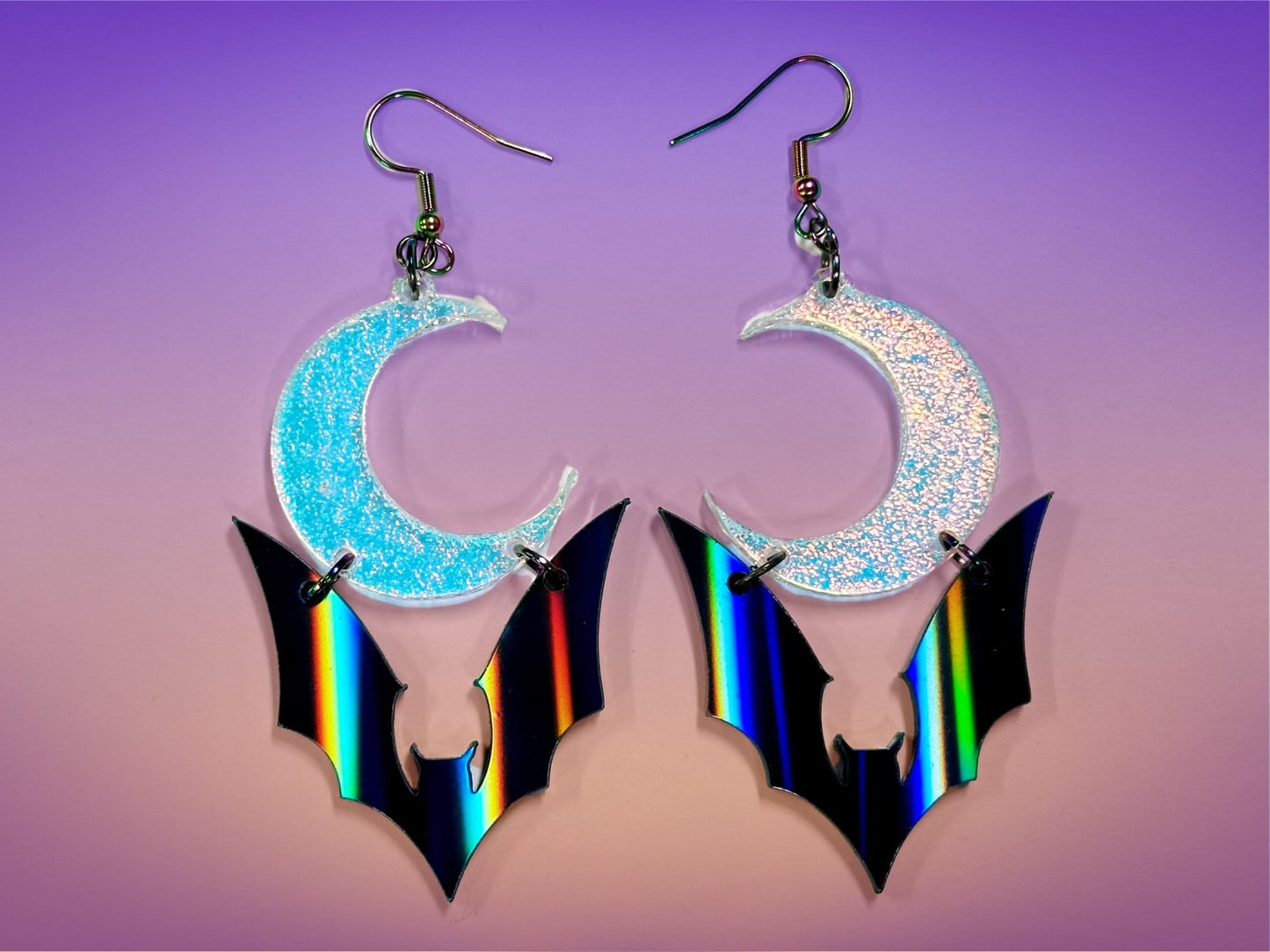 Bat and Crescent Moon Earrings | Black Rainbow Holographic and Iridescent Halloween Dangles ! - Painted Raina