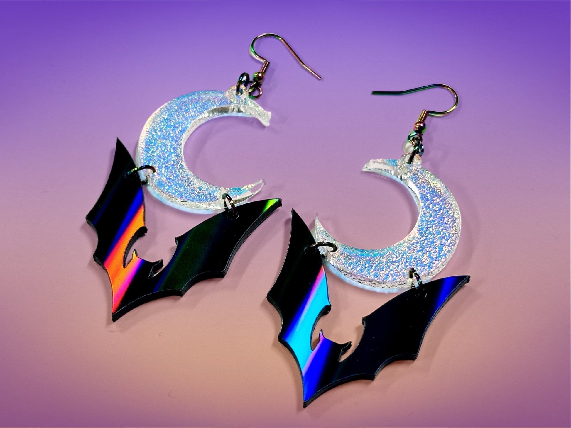 Bat and Crescent Moon Earrings | Black Rainbow Holographic and Iridescent Halloween Dangles ! - Painted Raina