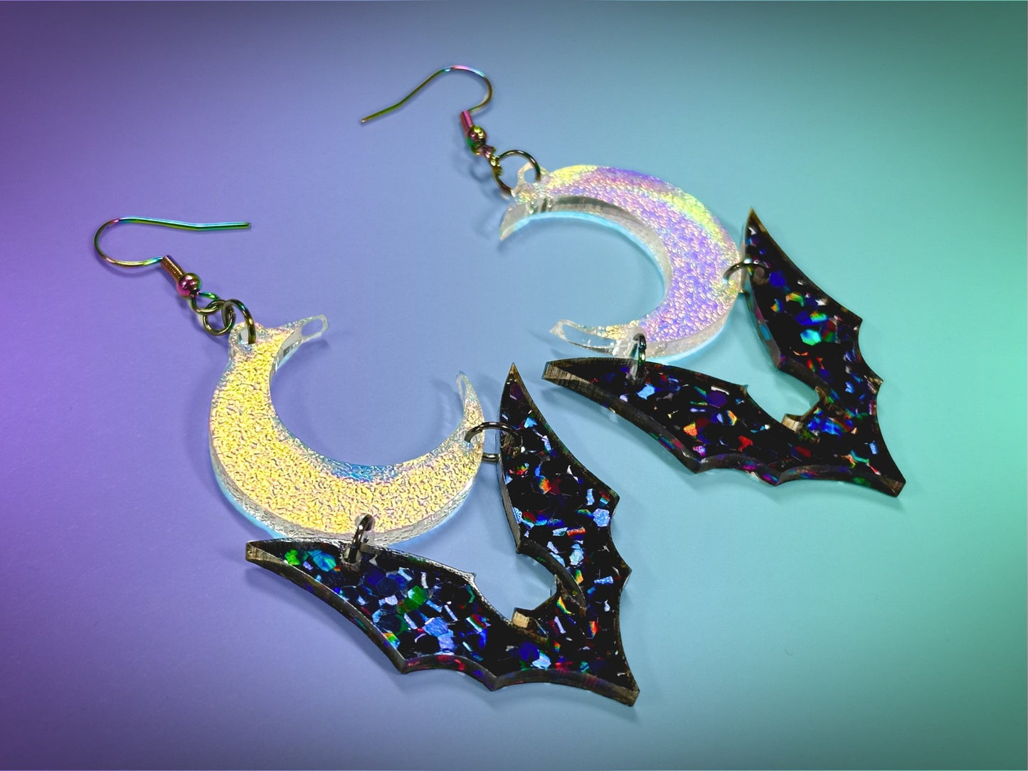 Bat and Crescent Moon Earrings | Chunky Jewel Hex Glitter and Iridescent Halloween Dangles ! - Painted Raina