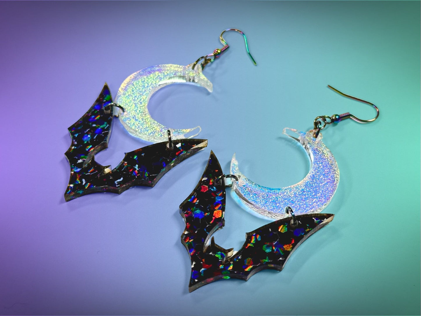 Bat and Crescent Moon Earrings | Chunky Jewel Hex Glitter and Iridescent Halloween Dangles ! - Painted Raina