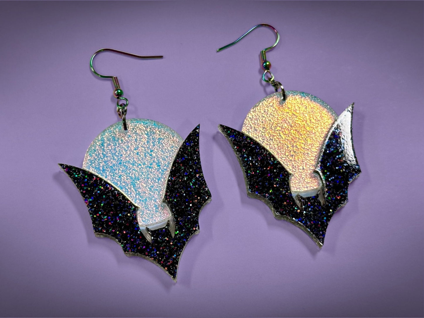 Bat and Full Moon Earrings | Black Rainbow Glitter and Textured Iridescent Halloween Dangles - Painted Raina