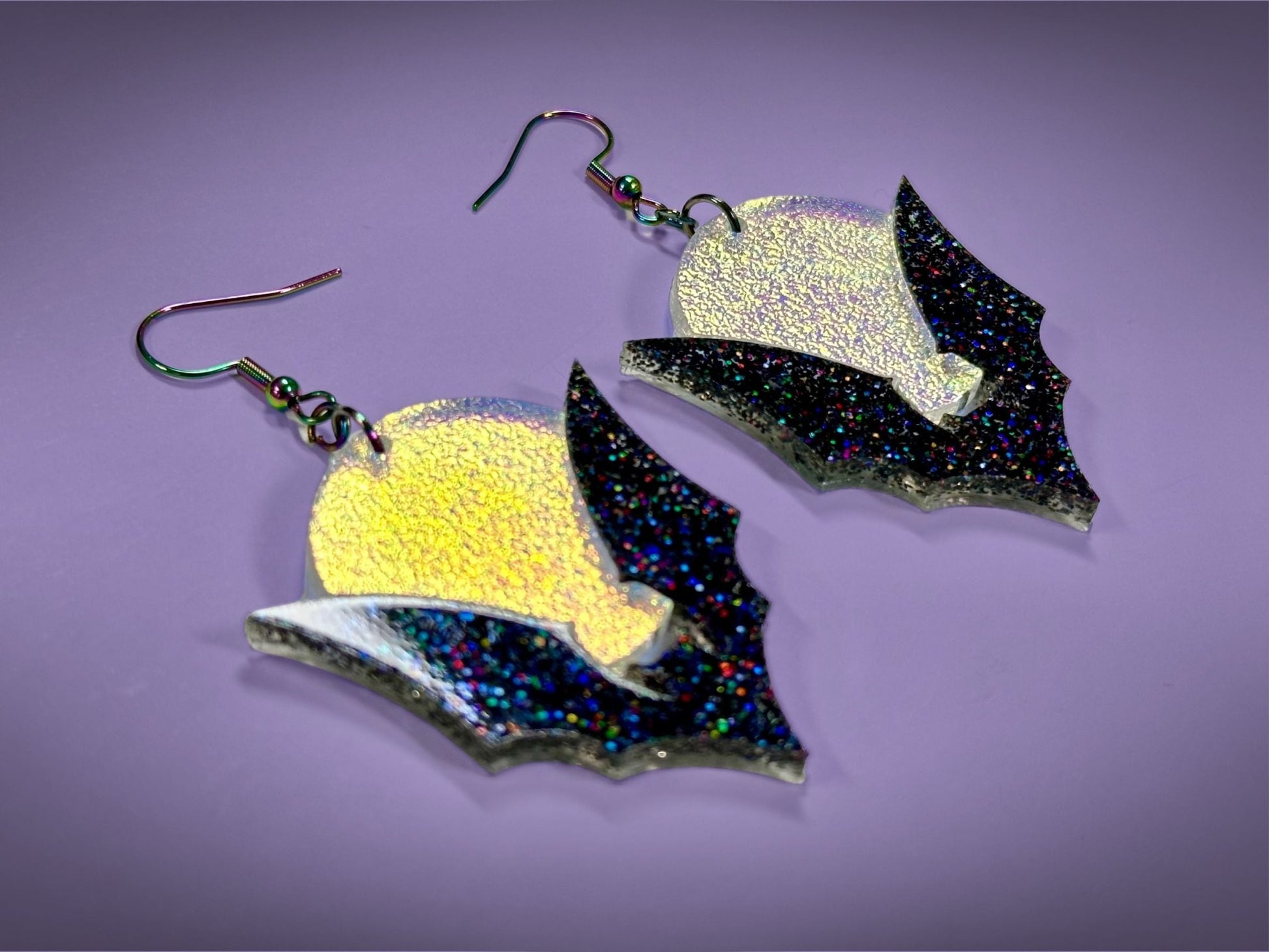 Bat and Full Moon Earrings | Black Rainbow Glitter and Textured Iridescent Halloween Dangles - Painted Raina