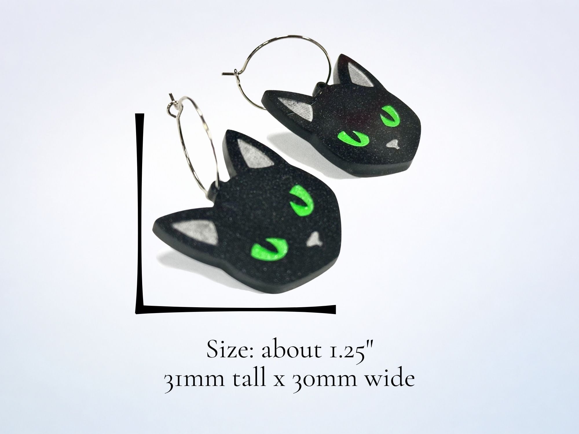 Size reference image showing dimensions of black cat acrylic hoop earrings in inches and millimeters