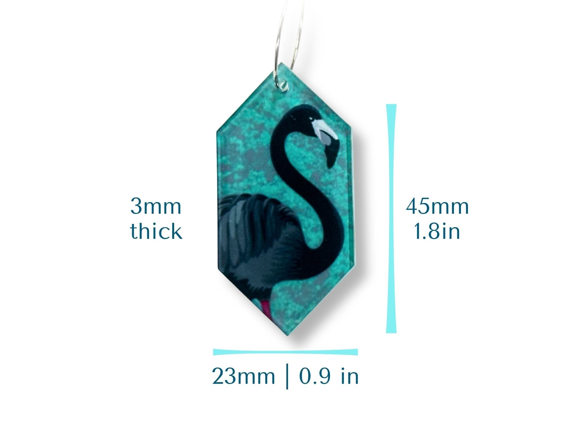 Size reference graphic showing black flamingo earring dimensions and thickness