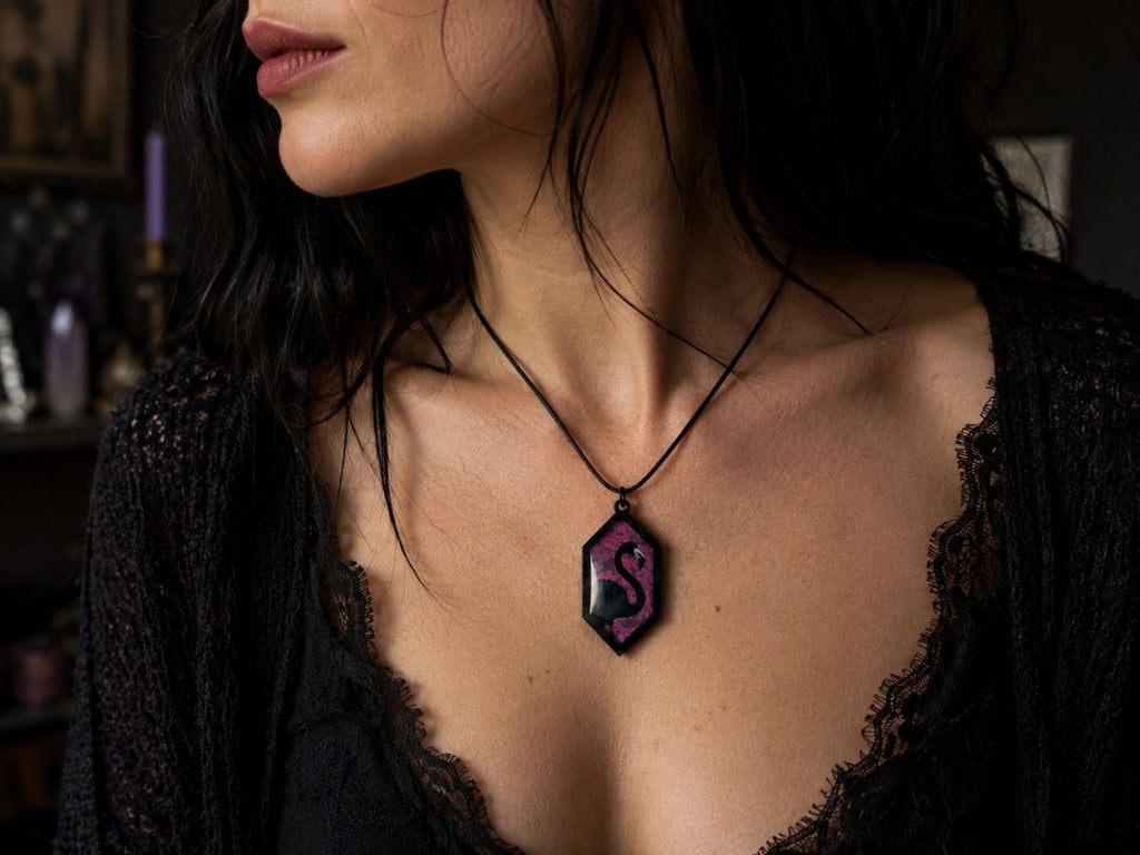 Woman wearing Arcadia Pink black flamingo statement pendant necklace