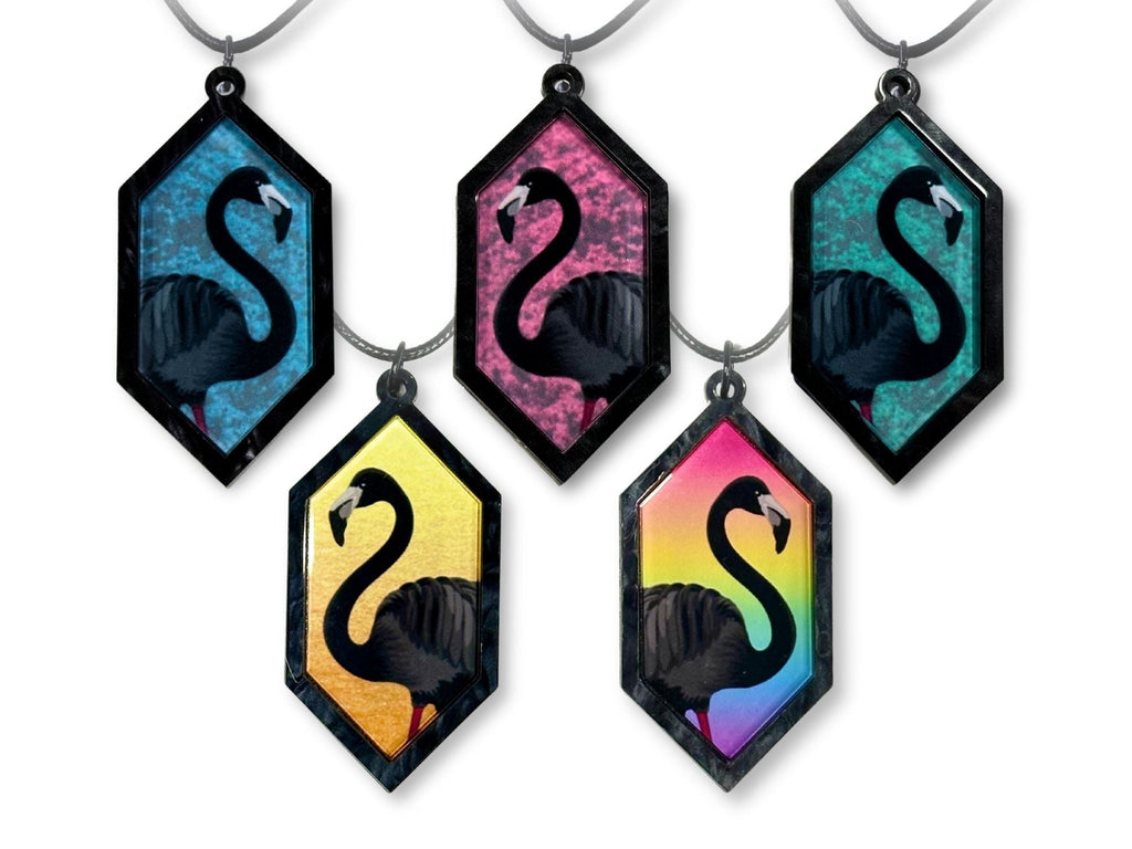 Five color variations of the black flamingo hexagon pendant necklace collection