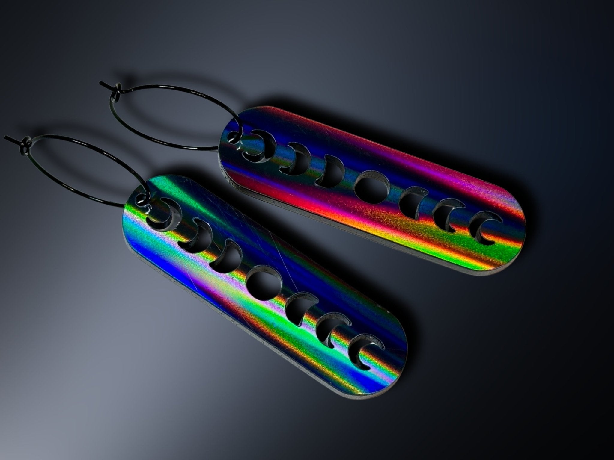 Black Magic moon phase earrings with vivid blue, green, red and purple iridescent finish