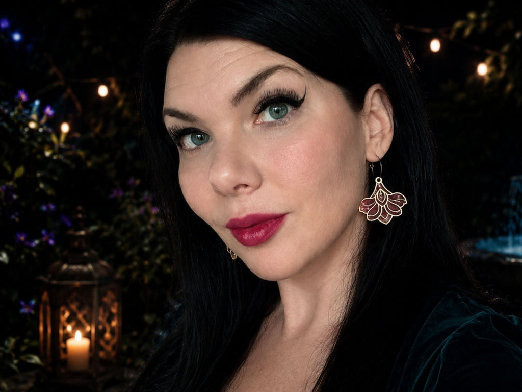 Model wearing Deco Bloom earrings by Painted Raina