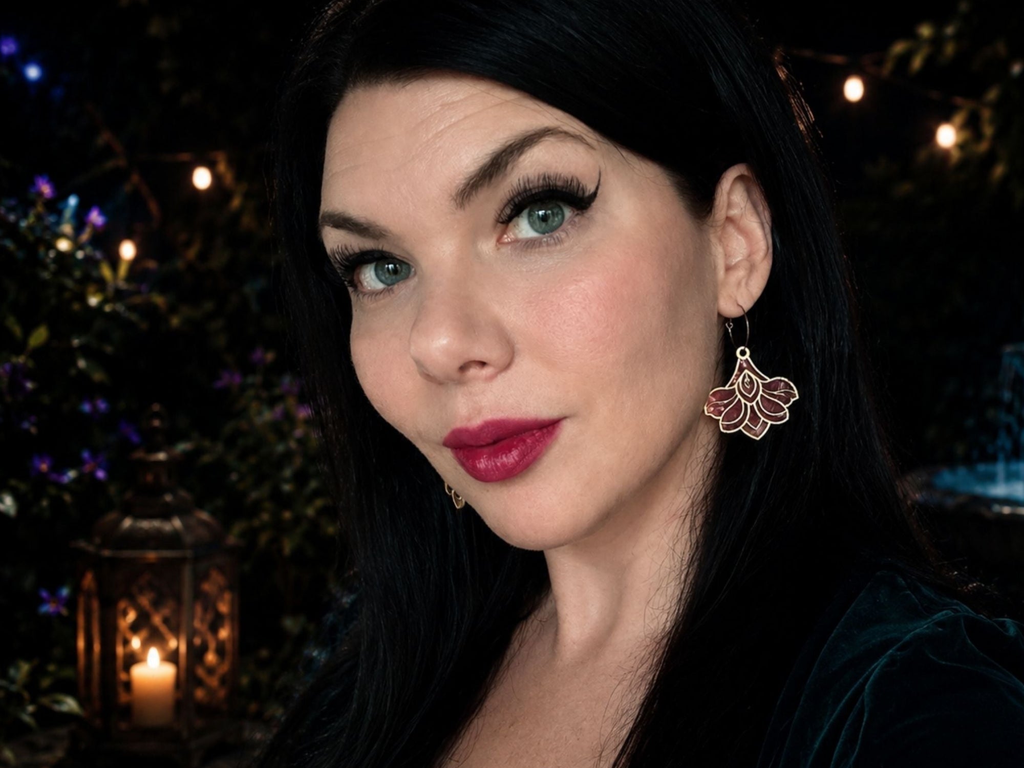 Model wearing Deco Bloom earrings by Painted Raina