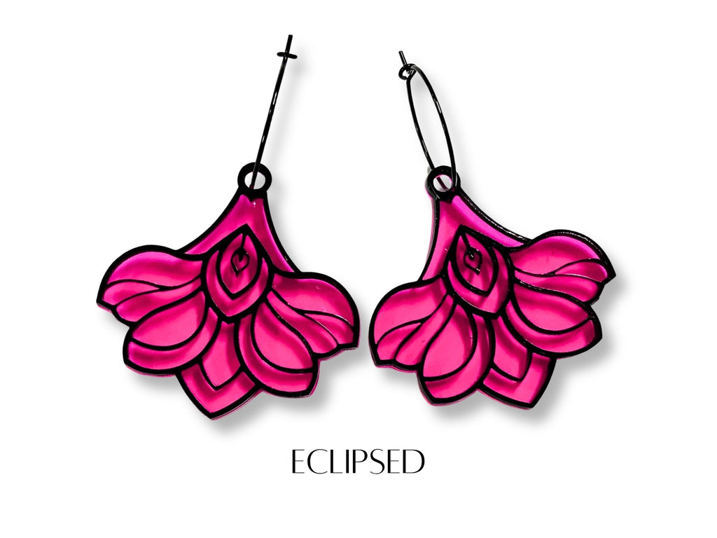 Eclipsed edition Deco Bloom earrings with black detailing and vivid pink acrylic