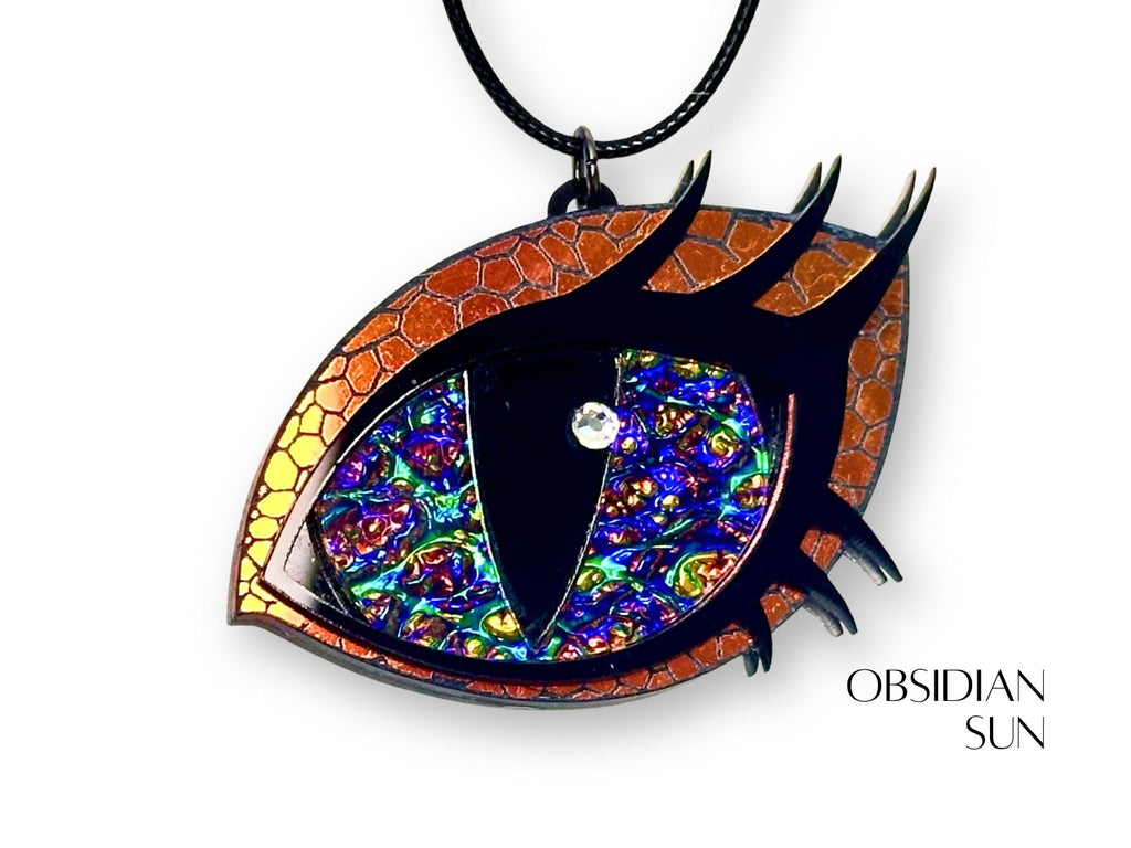 layered acrylic dragon eye necklace dichrolam iris shifting color mythic statement jewelry with copper and rainbow details