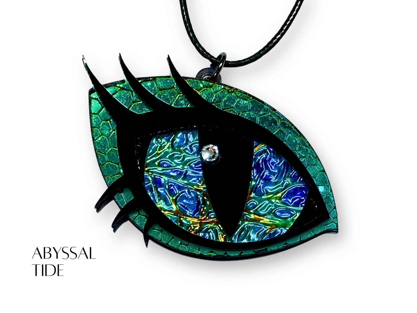 layered acrylic dragon eye necklace dichrolam iris shifting color mythic statement jewelry with teal, green and blue details