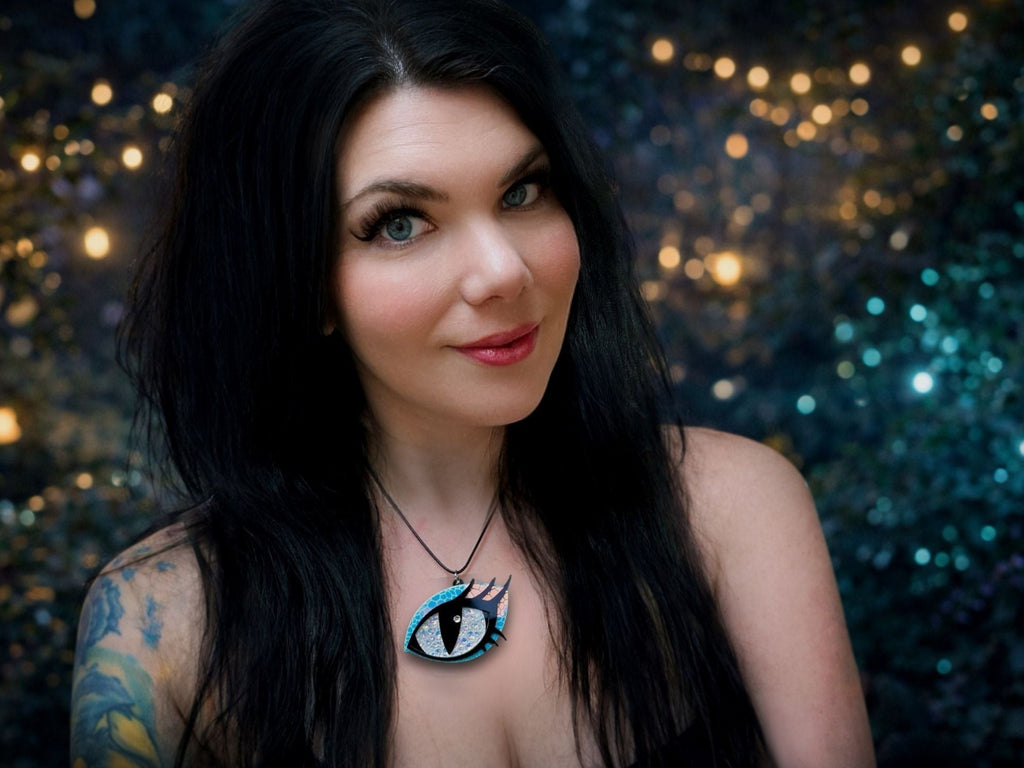 dragon eye statement necklace worn on model bold fantasy jewelry dichrolam pendant styling
