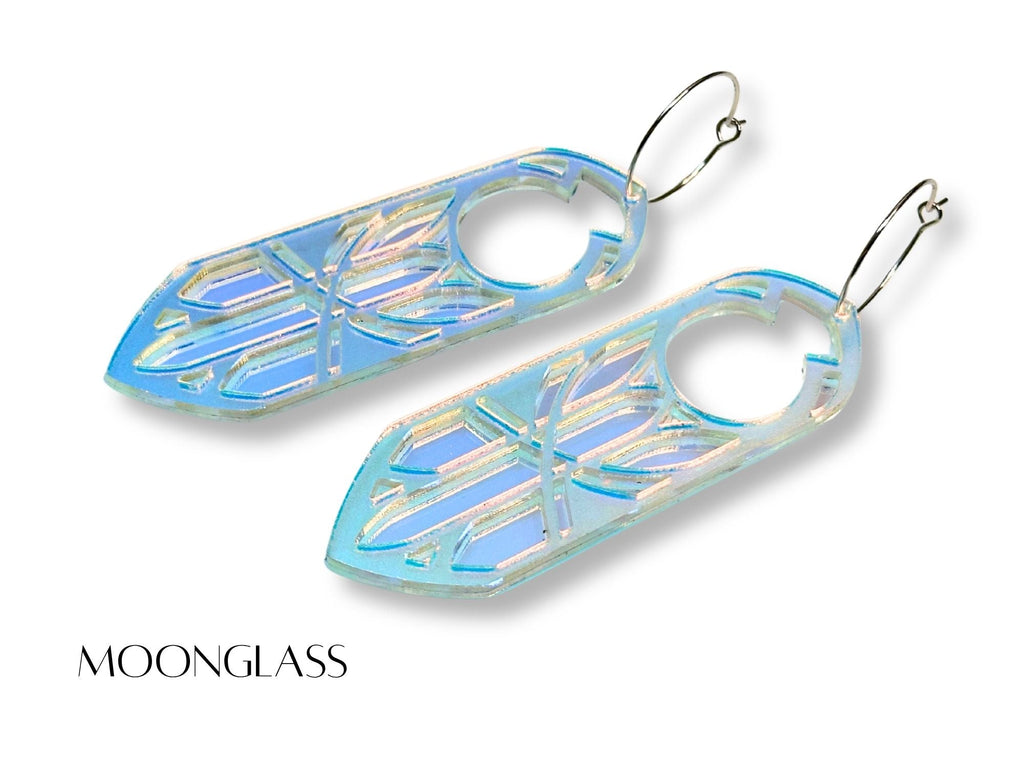 Blue iridescent Moonglass Disa statement earrings on white background