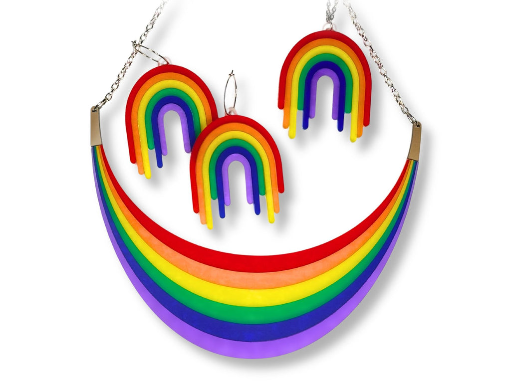 Full Spectrum Rebel Headliner Set featuring rainbow arc necklace, drip earrings, and matching pendant