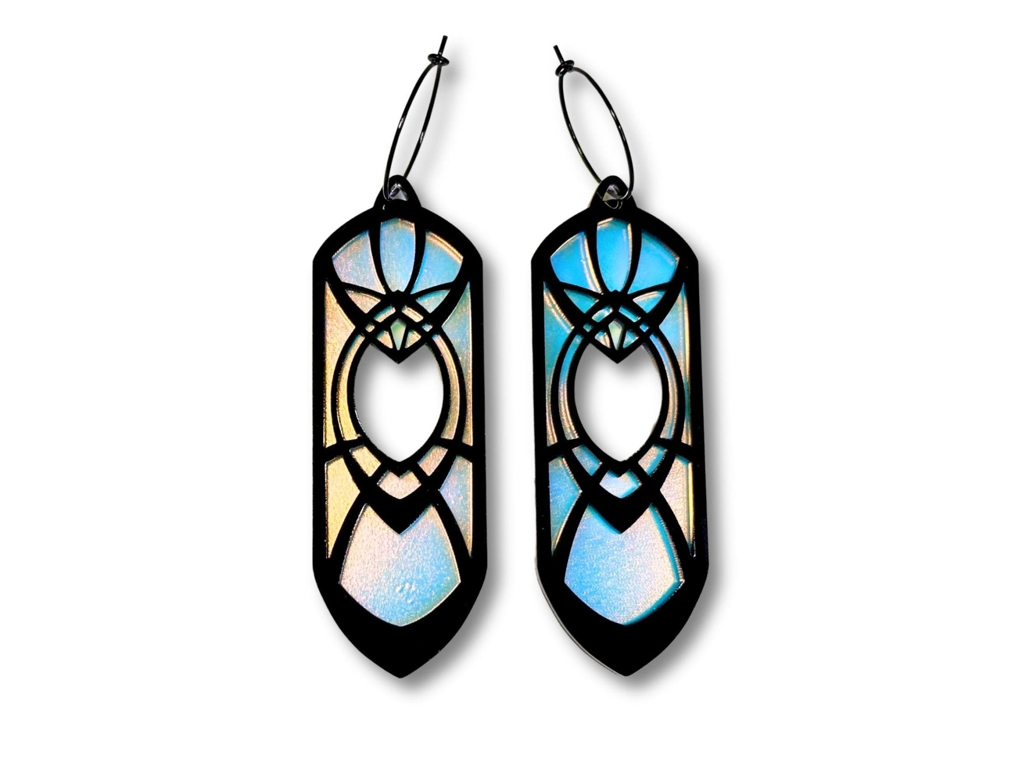 Black and blue iridescent Eowyn statement earrings on white background