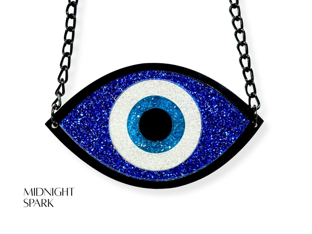 evil eye necklace detail showing texture variations glitter acrylic finishes