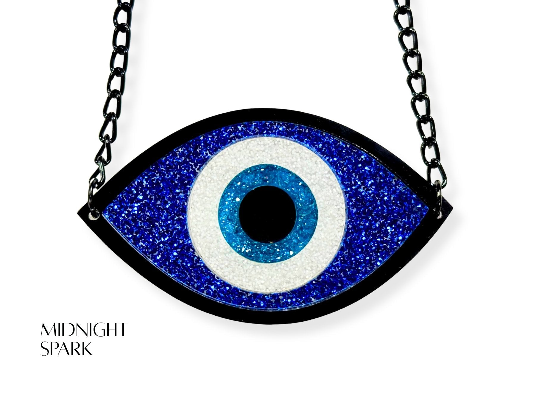 evil eye necklace detail showing texture variations glitter acrylic finishes