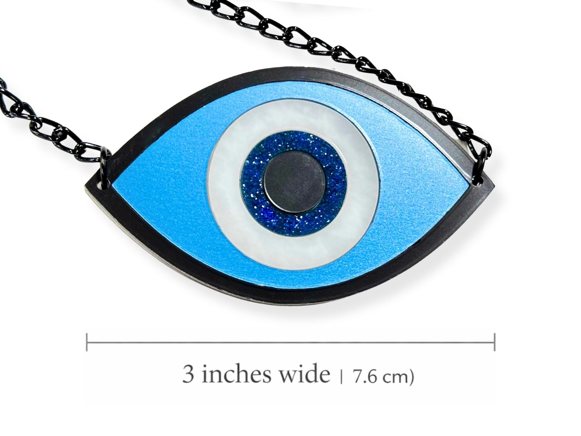 large evil eye necklace size reference showing bold statement pendant layered acrylic design