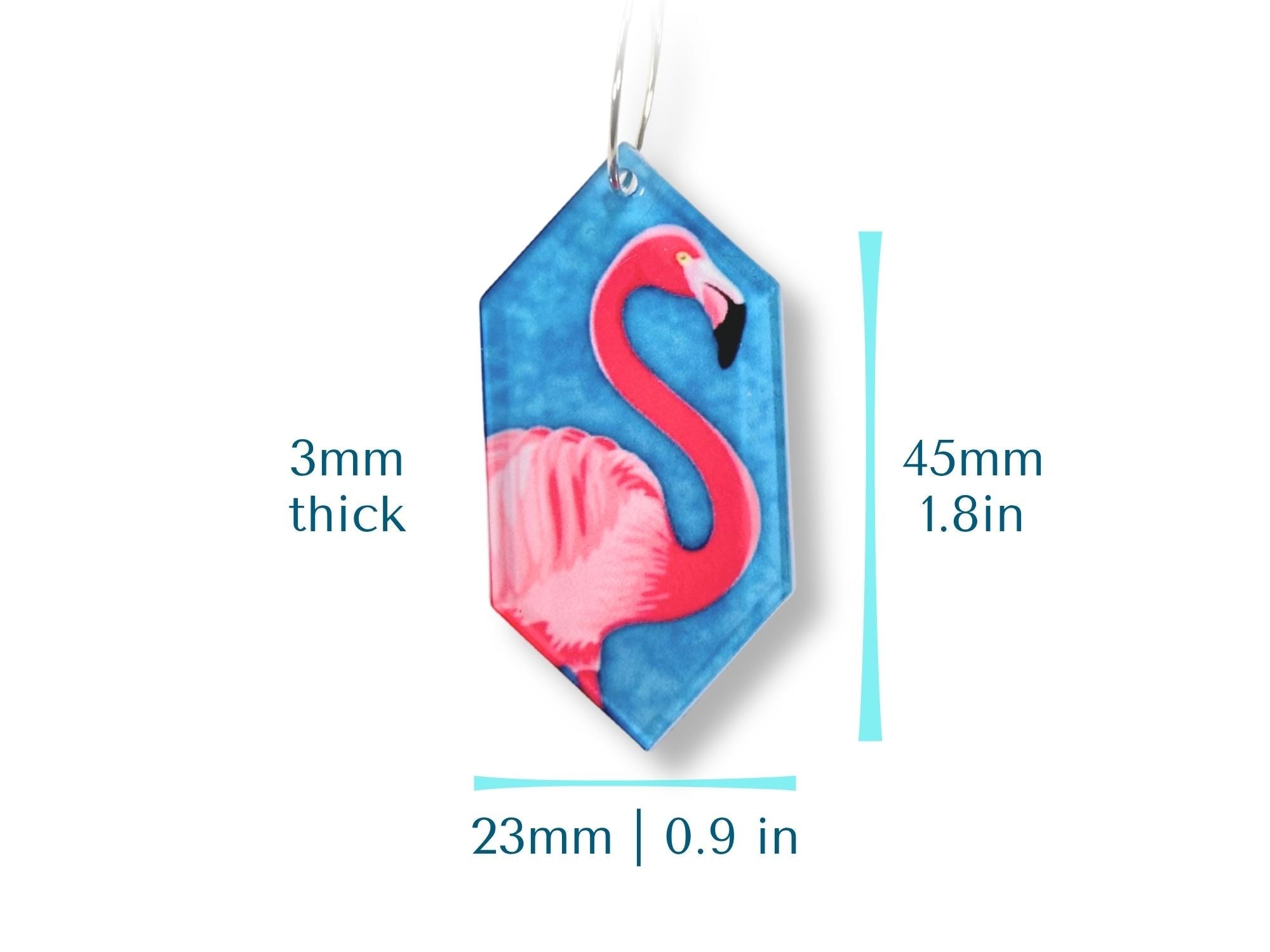 Size reference graphic showing flamingo earring dimensions and thickness