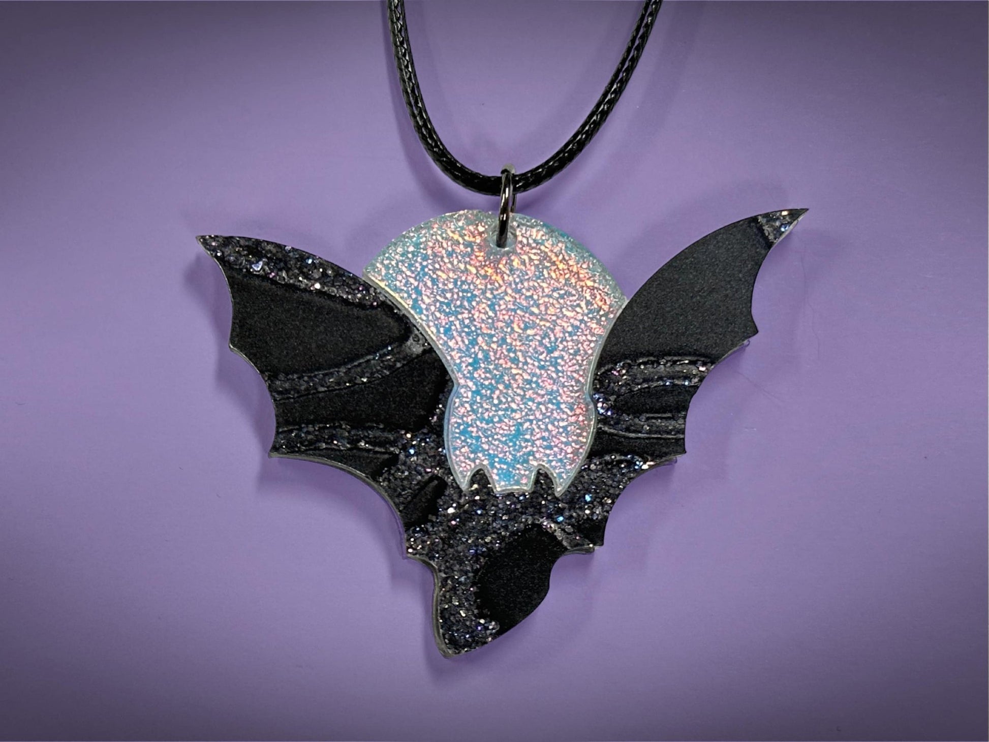 Flying Bat and Full Moon Pendant | Black Crackle Glitter and Textured Iridescent Halloween Necklace - Painted Raina