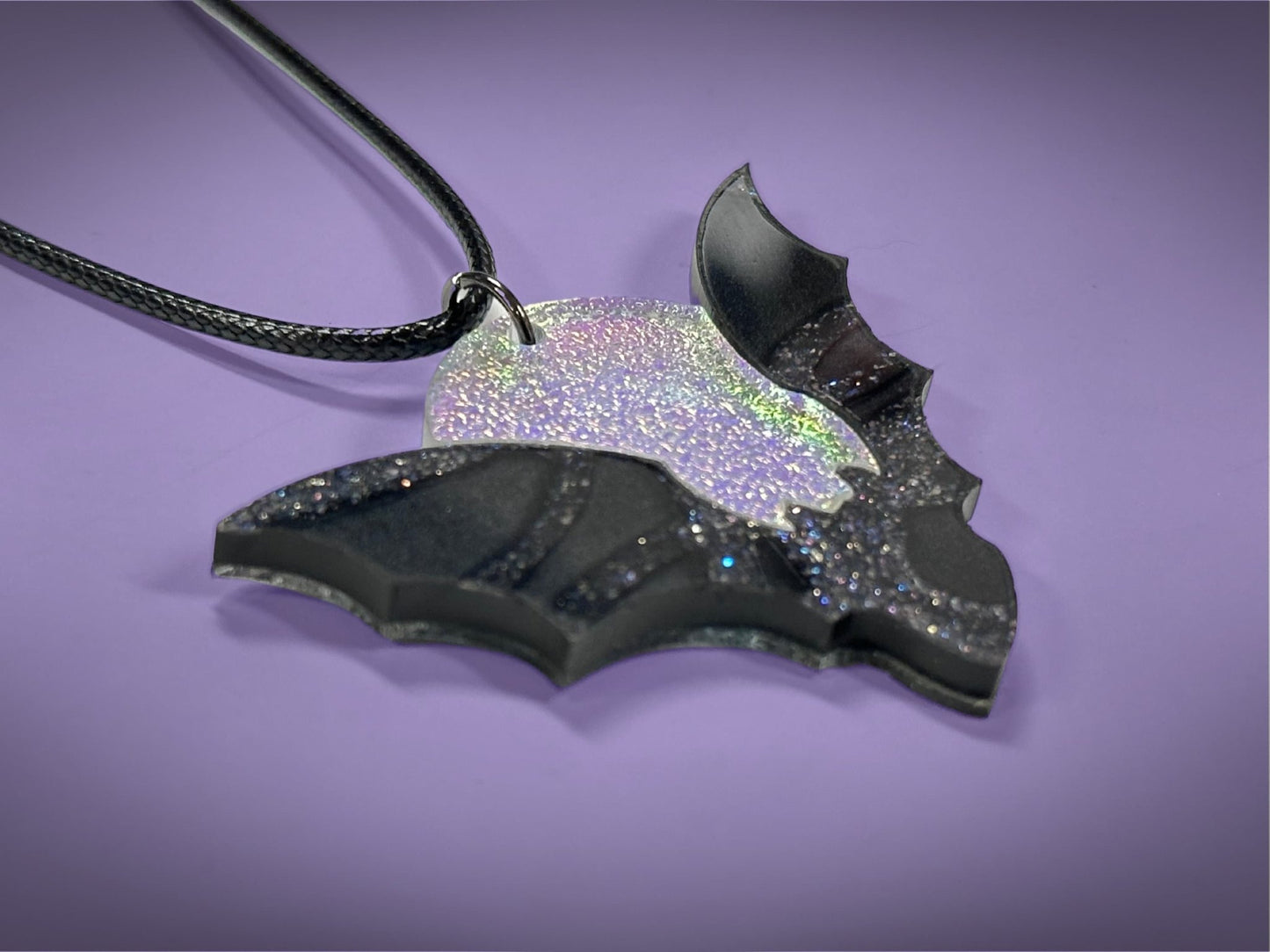 Flying Bat and Full Moon Pendant | Black Crackle Glitter and Textured Iridescent Halloween Necklace - Painted Raina