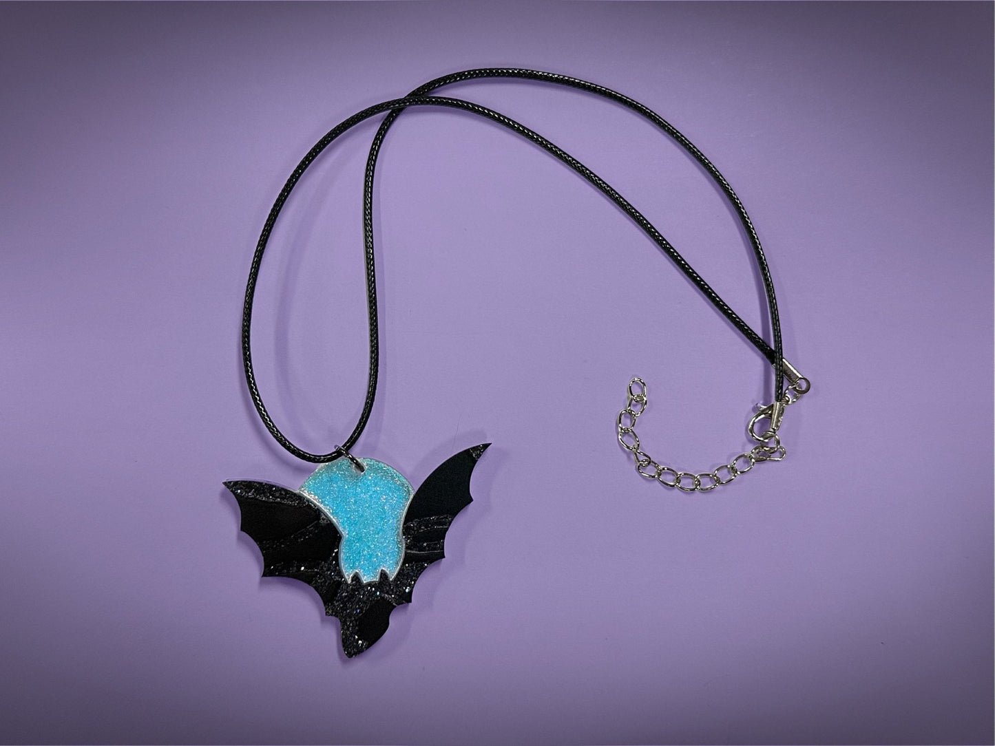 Flying Bat and Full Moon Pendant | Black Rainbow Holographic Glitter & Textured Iridescent Halloween Necklace - Painted Raina