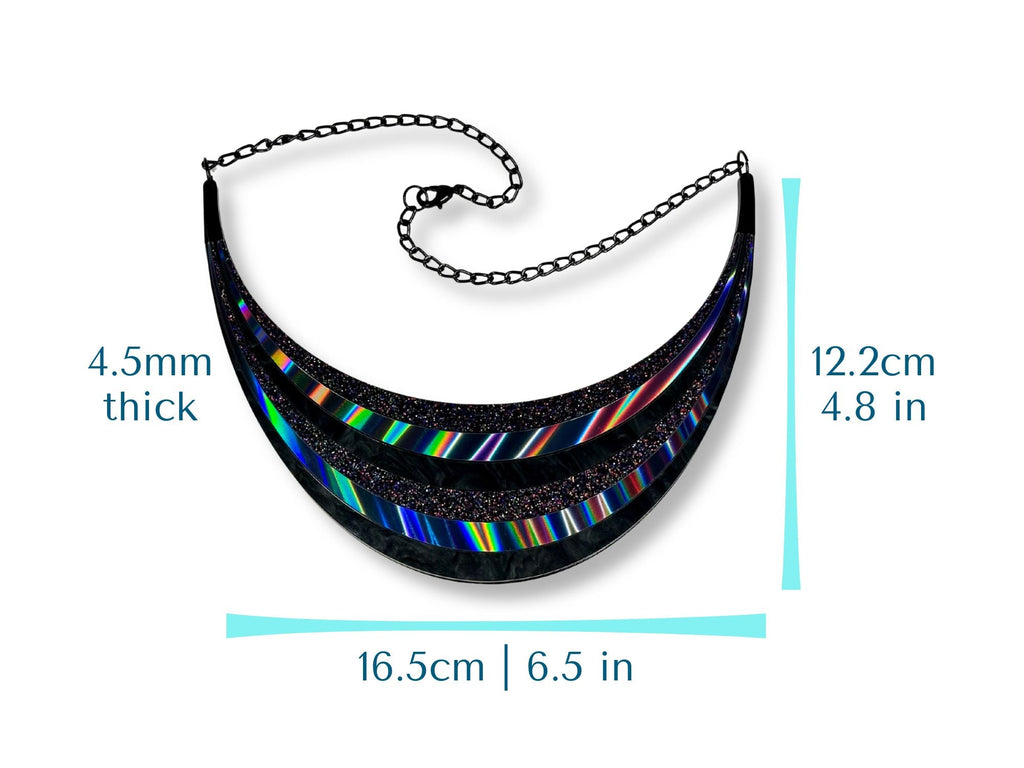 Size guide for Full Spectrum Rebel Arc Statement Necklace showing dimensions in inches and millimeters