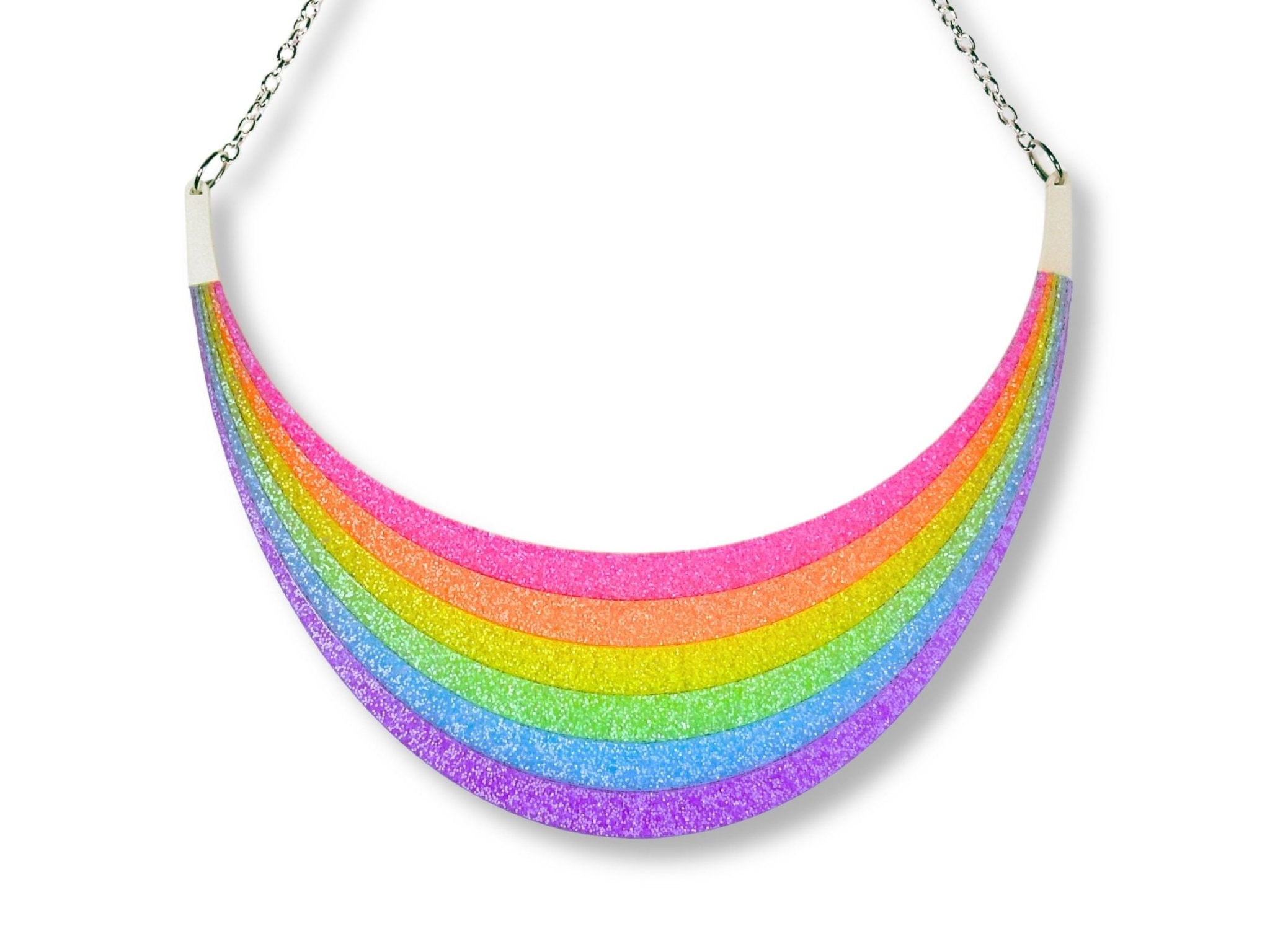 Full Spectrum Rebel Arc Statement Necklace in Rainbow Rave glitter acrylic with silver chain on white background.