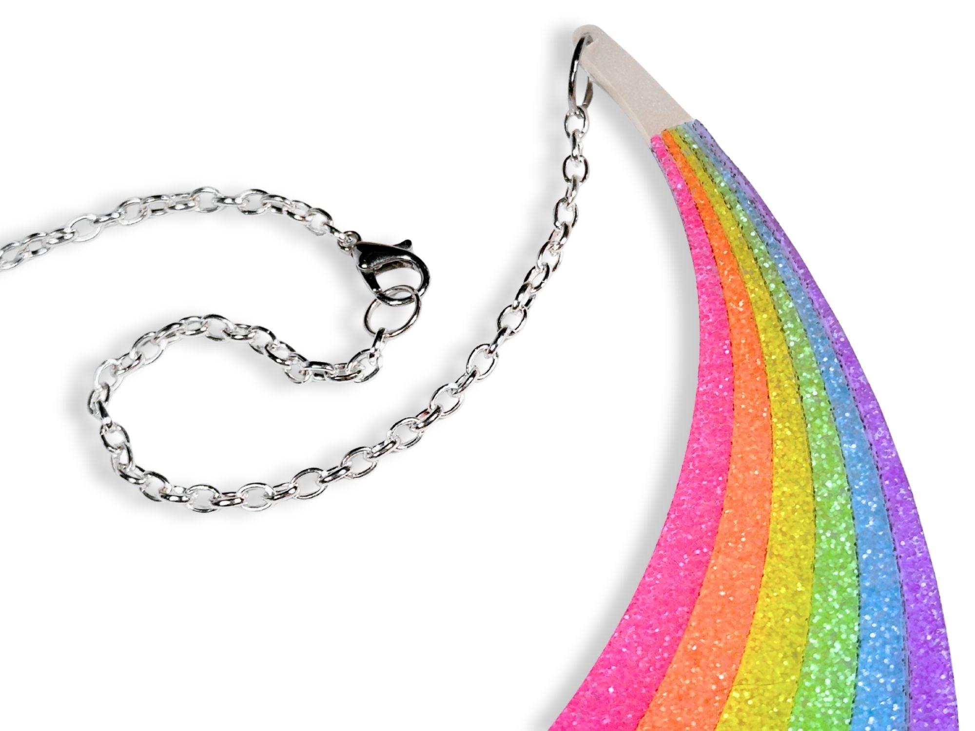 Close-up of Full Spectrum Rebel Rainbow Rave necklace chain attachment and glitter acrylic detail.