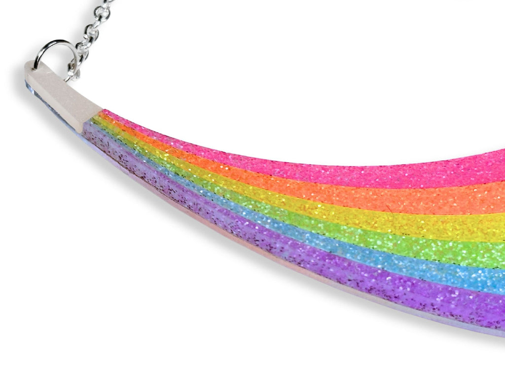 Close-up detail of Full Spectrum Rebel Rainbow Rave layered rainbow acrylic necklace curve.