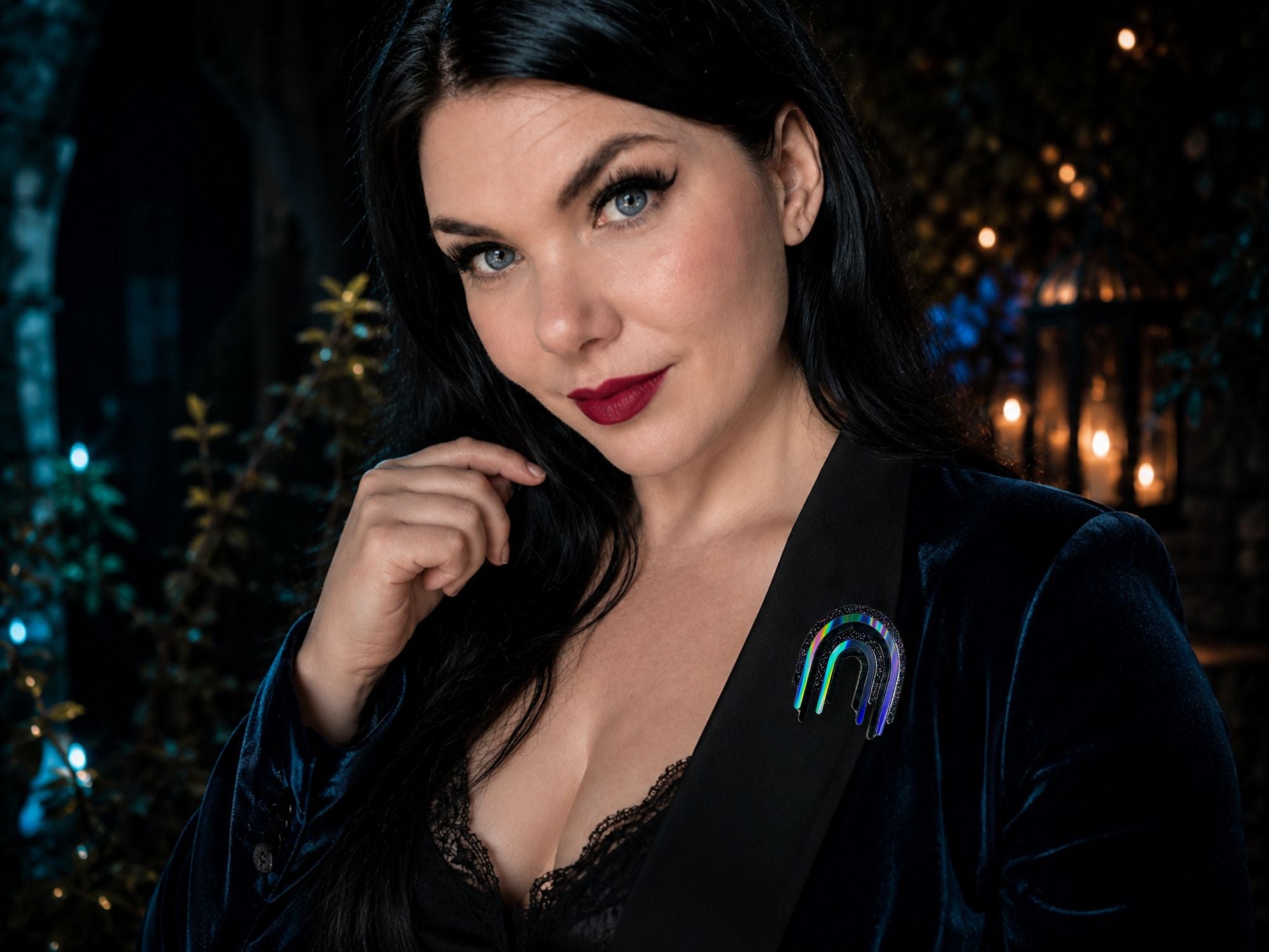 Model wearing Full Spectrum Rebel Drip Brooch in Black Rainbow colorway
