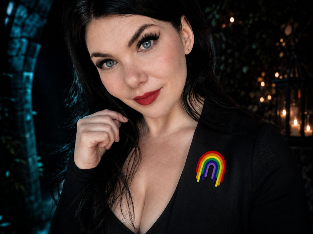 Model wearing Full Spectrum Rebel Drip Brooch on black blazer