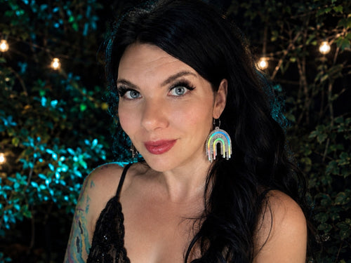 Model wearing Full Spectrum Rebel Drip Earrings in Disco Prism